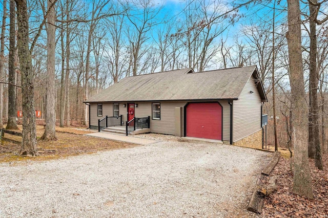 ranch-style house featuring a garage