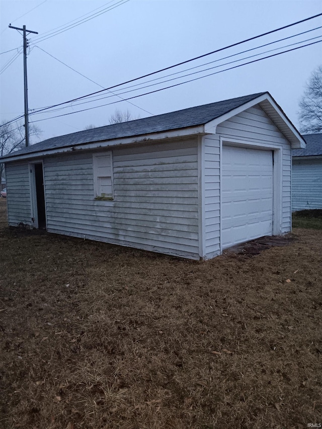 garage with a yard