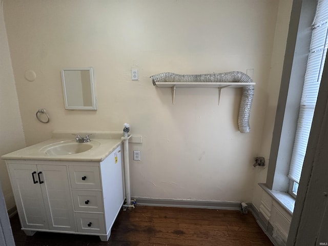 bathroom with vanity and wood-type flooring