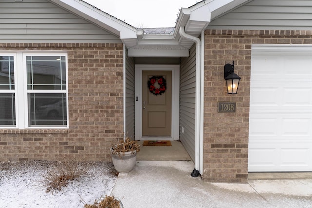 entrance to property with a garage