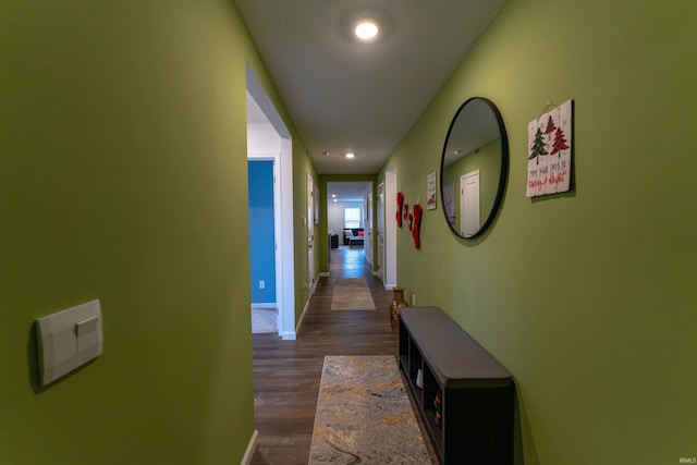 hallway featuring dark hardwood / wood-style floors