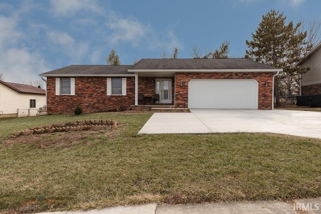 single story home featuring a garage and a front yard