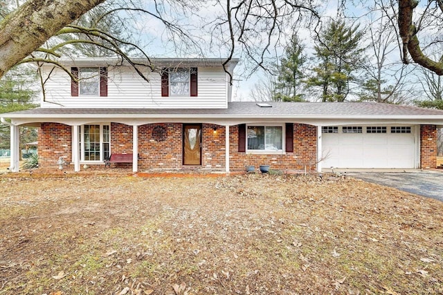 front of property featuring a garage