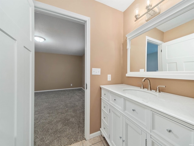 bathroom with tile patterned floors and vanity