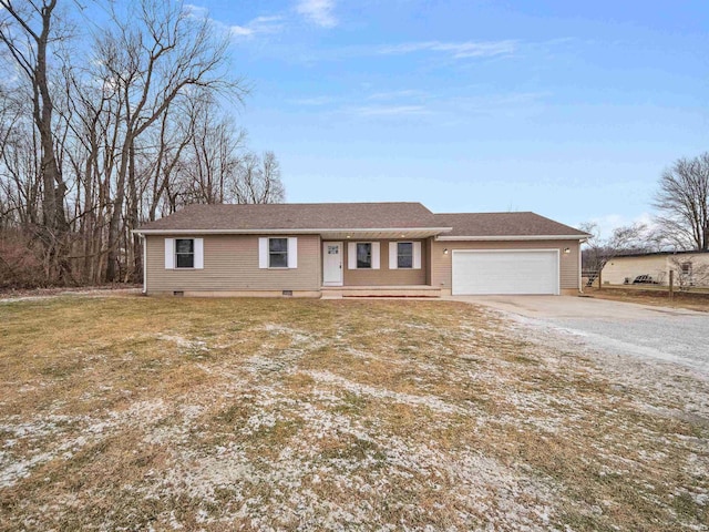 single story home featuring a garage and a front yard