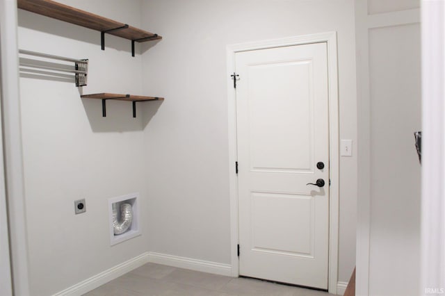 washroom with hookup for an electric dryer