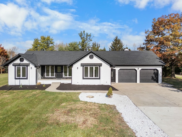 single story home with a garage, a front yard, and covered porch