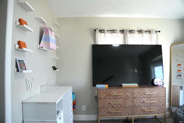 bedroom with a textured ceiling