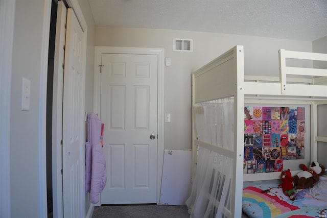 bedroom with a textured ceiling