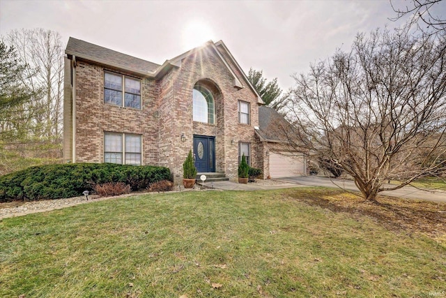 front of property with a garage and a front lawn