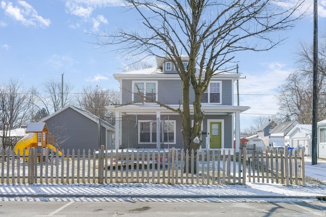 view of front of home featuring a playground