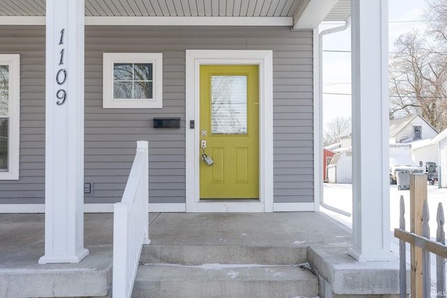 property entrance with a porch