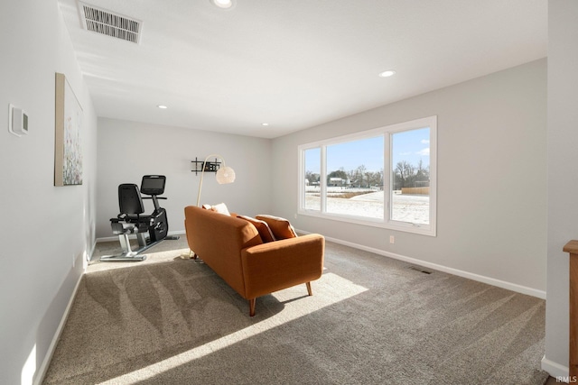 carpeted living room featuring recessed lighting, visible vents, and baseboards