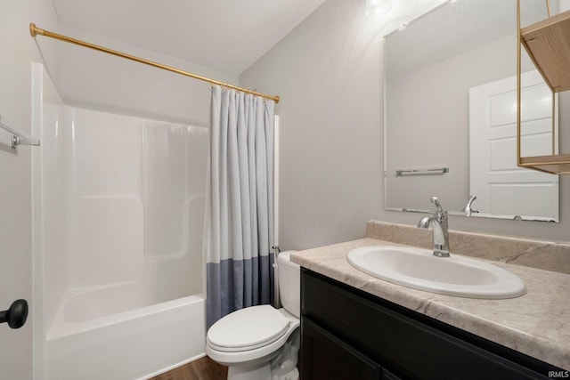bathroom with toilet, shower / bathtub combination with curtain, and vanity