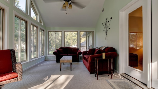 sunroom with lofted ceiling and ceiling fan