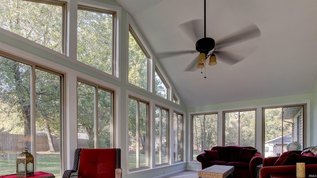 sunroom with lofted ceiling and ceiling fan