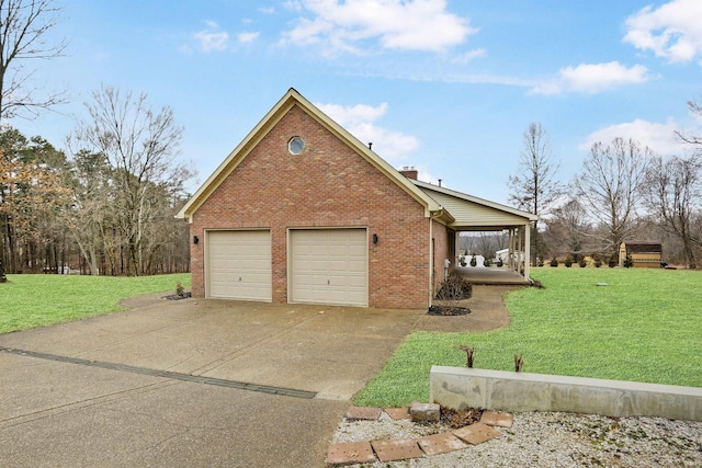 view of front of home with a garage and a front yard