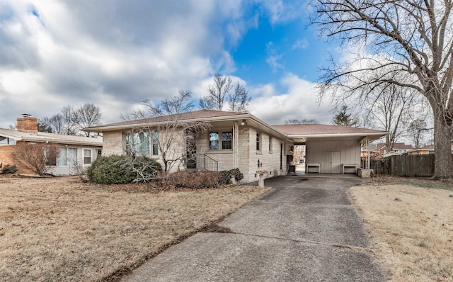 view of front of home with a carport