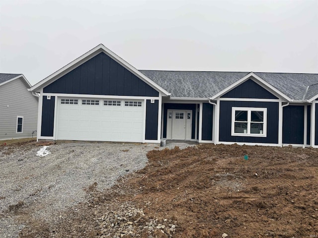 single story home featuring a garage