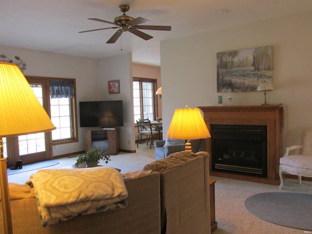 living room with light carpet and ceiling fan