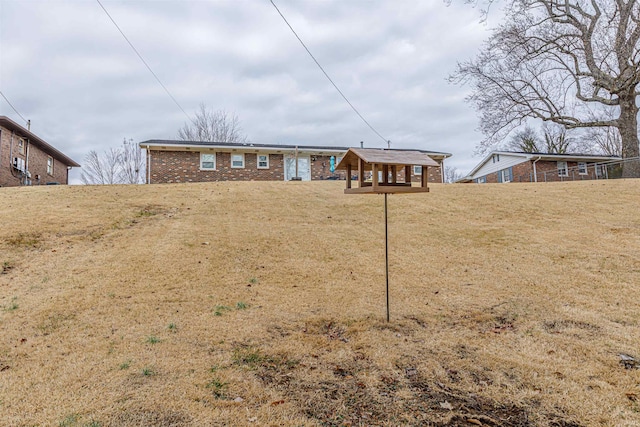 exterior space with a yard