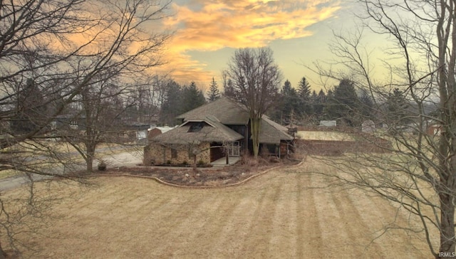 view of front of home with a lawn