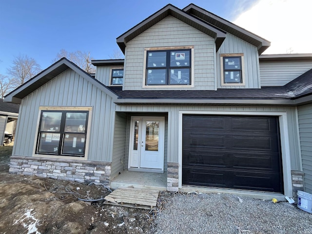 view of front of property featuring a garage