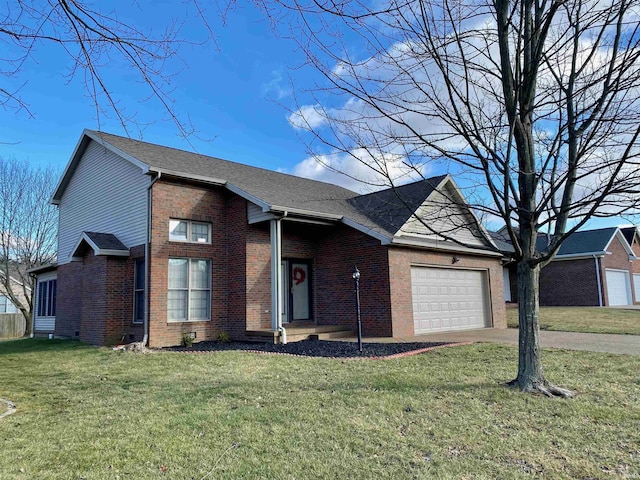 view of front of house featuring a garage and a front lawn