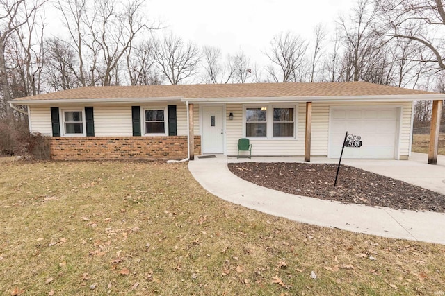 single story home featuring a garage and a front yard