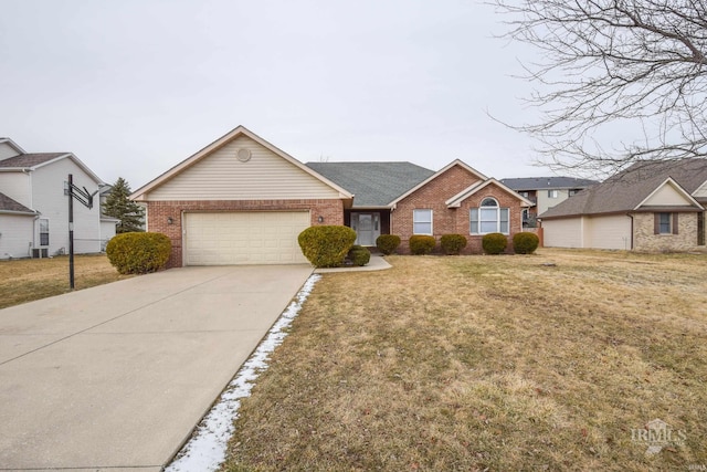 ranch-style home featuring a garage and a front yard