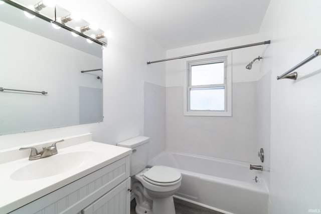 full bathroom with washtub / shower combination, vanity, and toilet