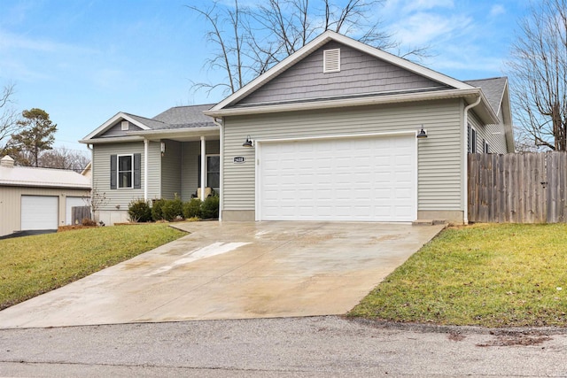 view of front of home with a garage and a front yard