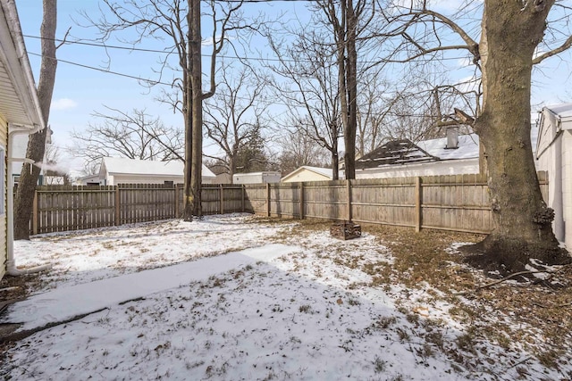 view of yard covered in snow