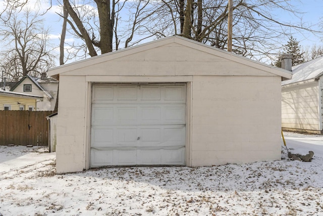 view of snow covered garage