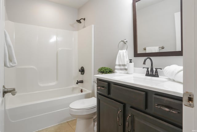 full bathroom with tile patterned flooring, vanity, shower / bathing tub combination, and toilet