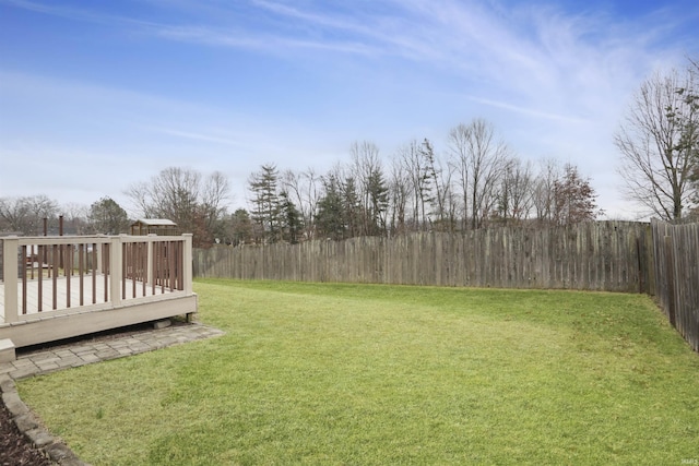 view of yard with a deck