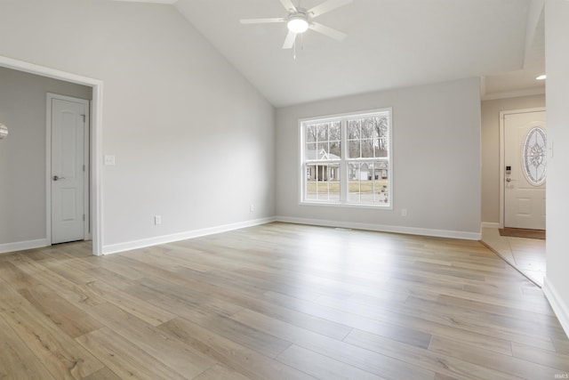 interior space with ceiling fan, high vaulted ceiling, and light wood-type flooring