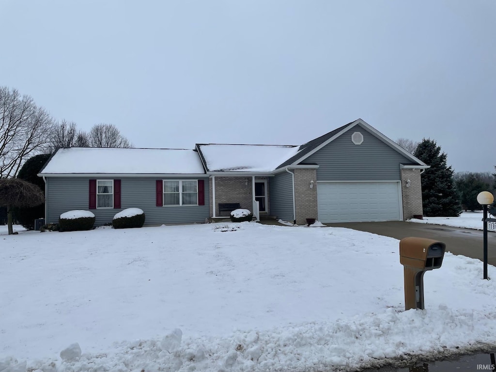 single story home featuring a garage