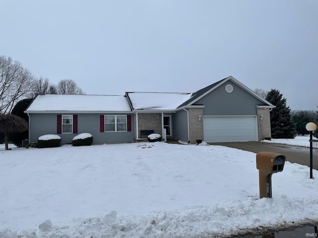 single story home featuring a garage