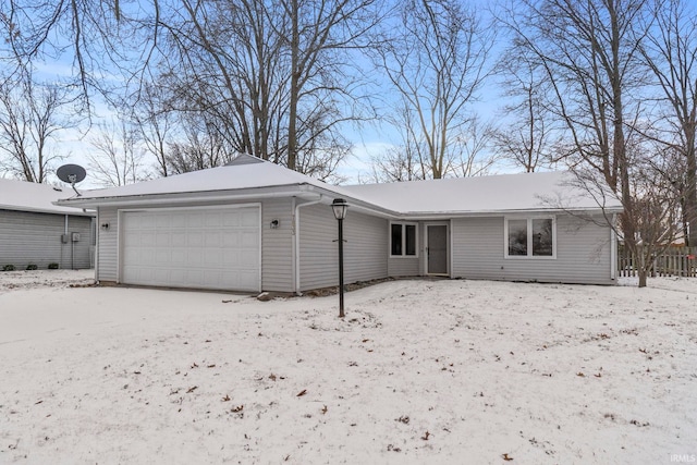 ranch-style home with a garage