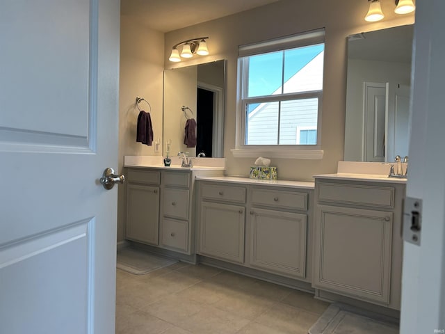 bathroom with vanity and tile patterned flooring