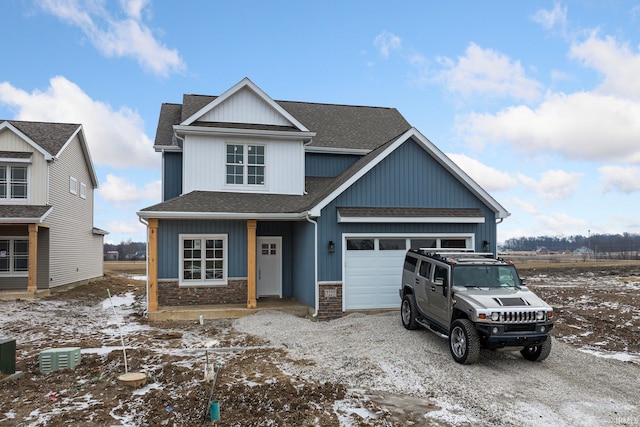 craftsman-style home featuring a garage