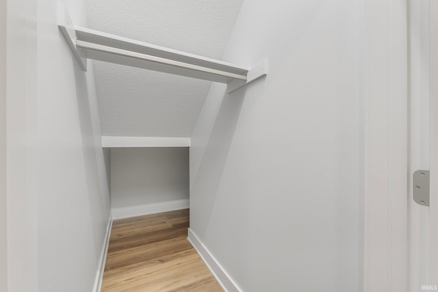 walk in closet featuring light wood-type flooring