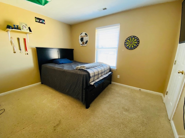 bedroom with light carpet