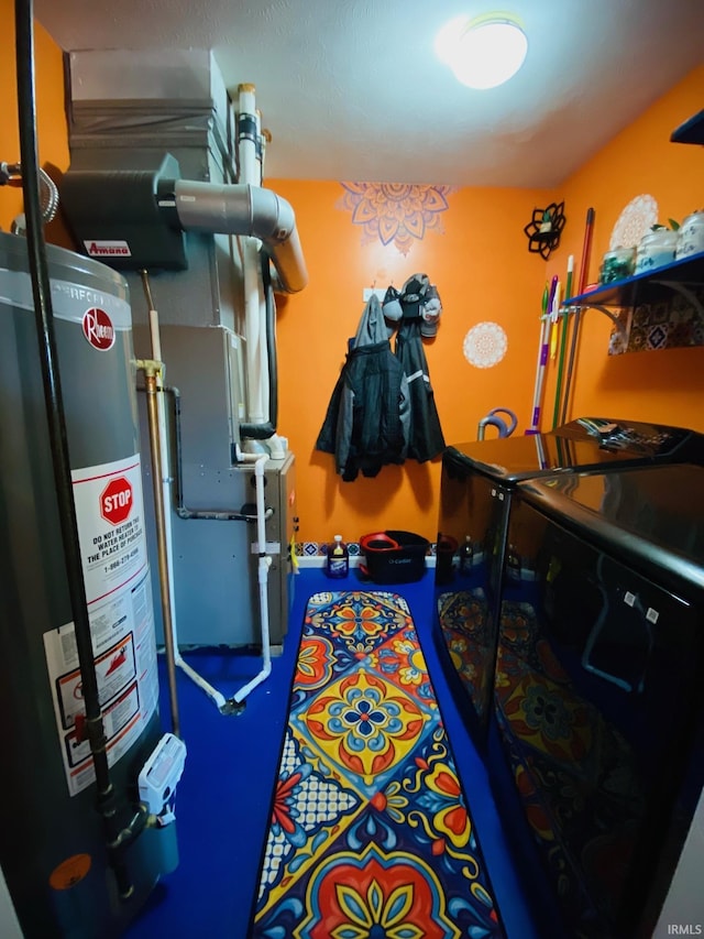 utility room with gas water heater