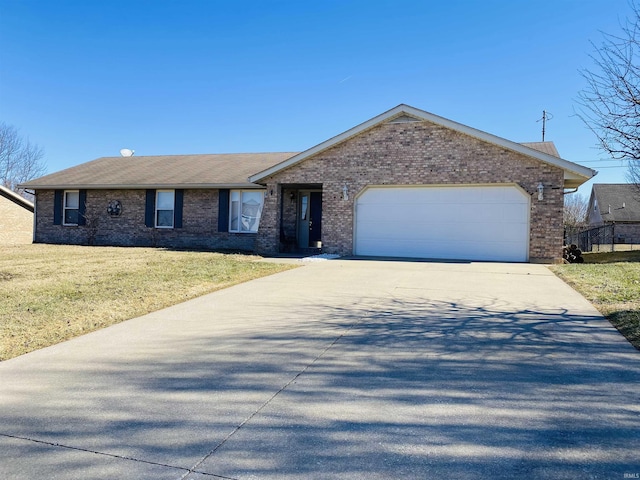 single story home with a garage and a front yard