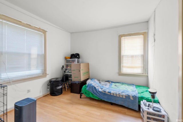 bedroom featuring hardwood / wood-style floors