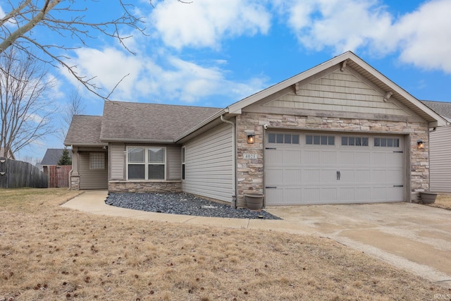 ranch-style home featuring a garage and a front lawn