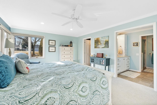 bedroom with crown molding, light colored carpet, connected bathroom, and ceiling fan