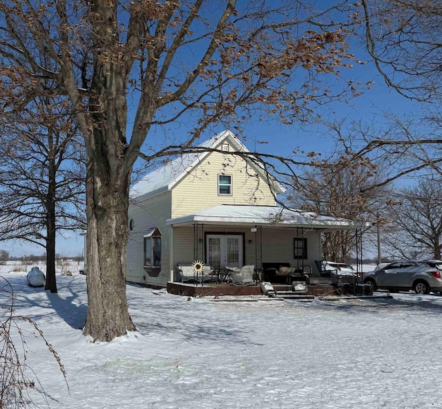 view of front of house with french doors and a porch